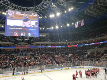 American and Czech flags flying in the arena above the ice