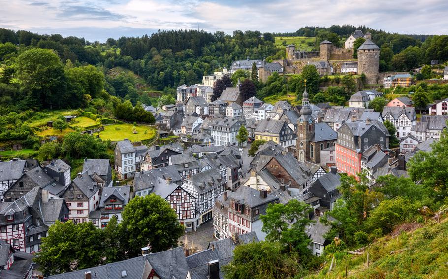 Historical Monschau town in the hills of the Eifel region, Germany, famous for its medieval slate roof, half-timbered houses