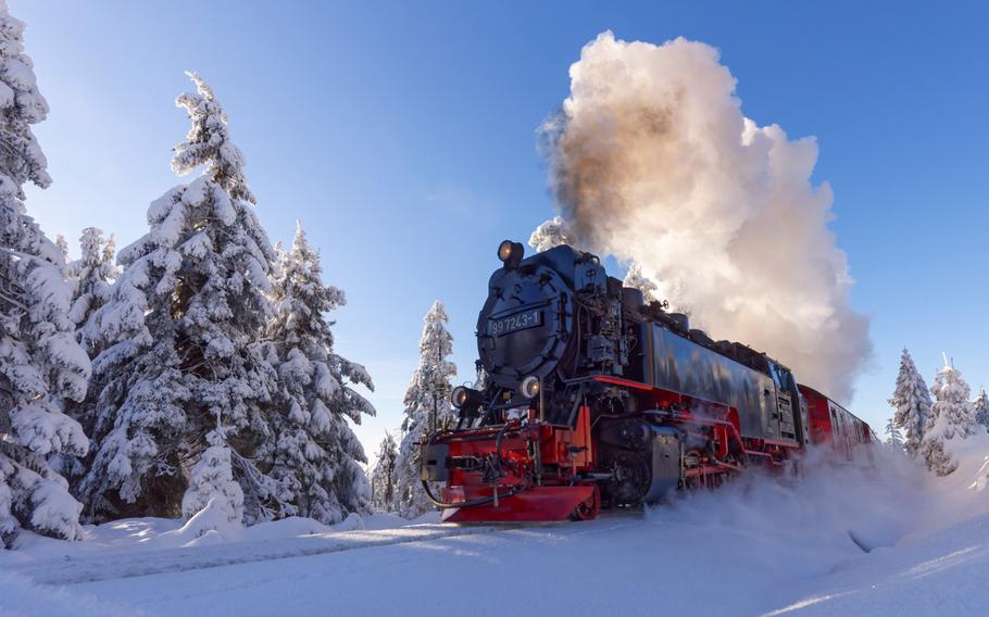 Historic Harz Mountain Train ascending to Brocken Peak with scenic views of Harz National Park.