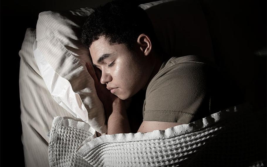 A service member sleeps after his duty day at Joint Base San Antonio-Lackland, Texas, on March 24, 2023. According to the Centers for Disease Control and Prevention, sleep is critical for heart health. Poor sleep habits have been linked to high blood pressure, type 2 diabetes, and obesity. 