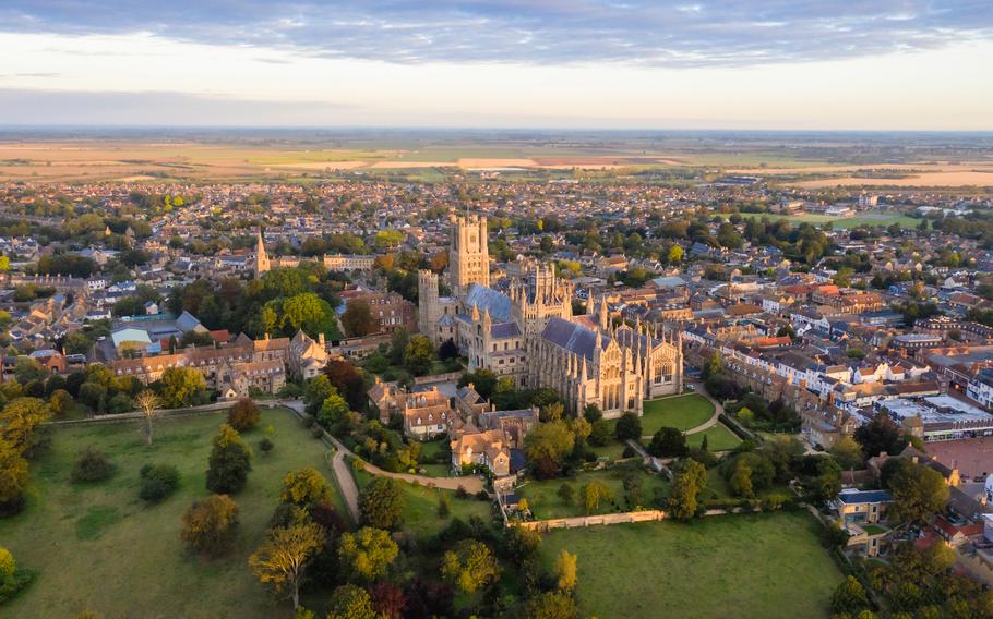 a birds eye view of the cathedral lit in the morning light 