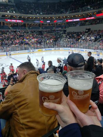 Two beers held in hands