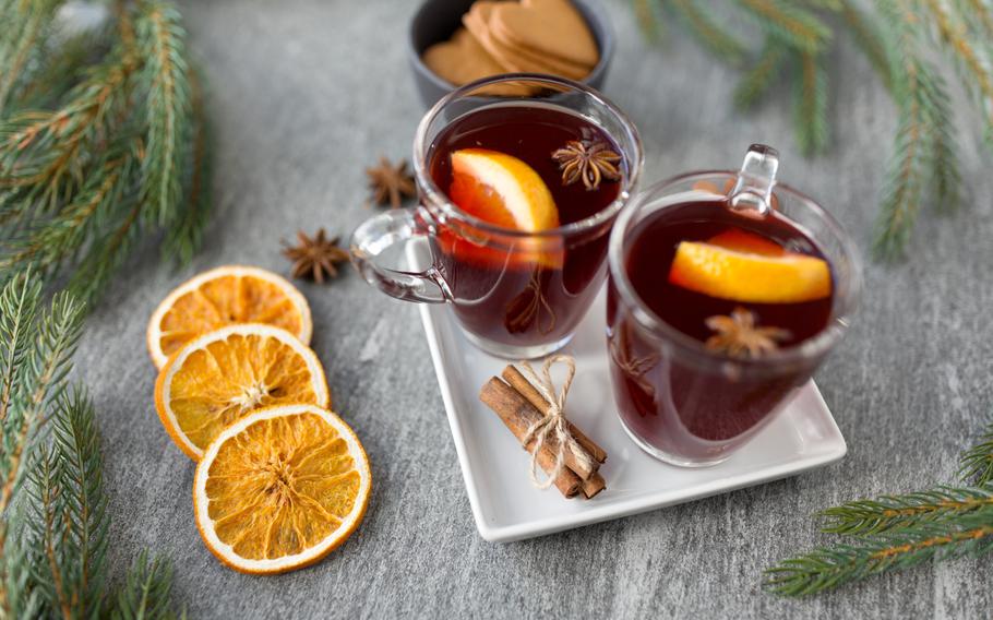 mulled wine, orange slices, gingerbread and spices