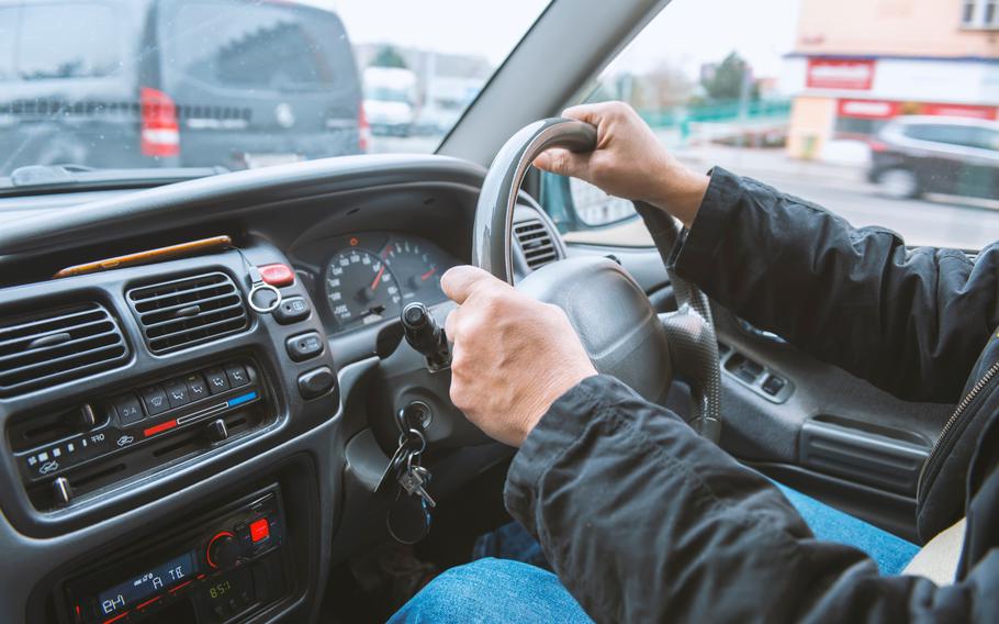 Driver in a British vehicle