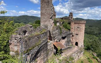 Three medieval castle ruins in Dahn, Germany share a clifftop.