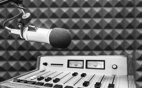 Professional microphone and sound mixer in radio station studio