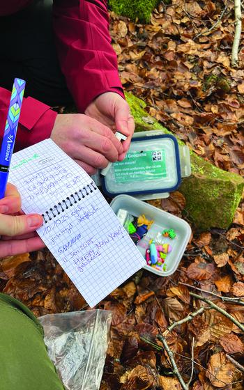 Inside a geocache: logbook and tradable items