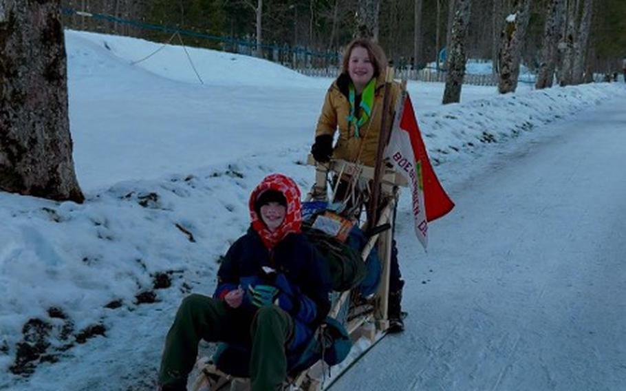 A well-deserved break on the sled that these members of Troop 44 assembled.