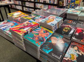 Manga stacked on a table