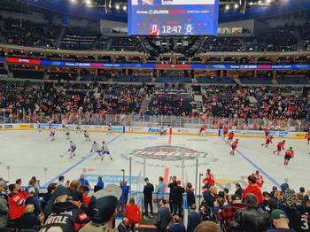 Pre-game warm-ups with the hockey players on the ice