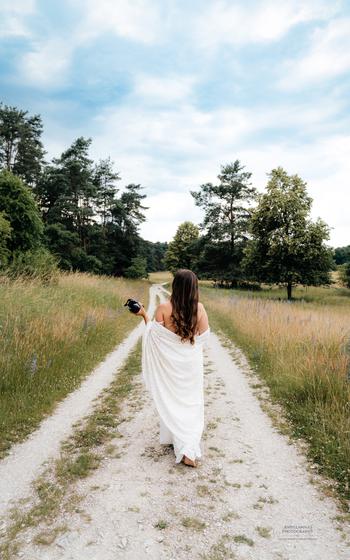 Woman walking with camera