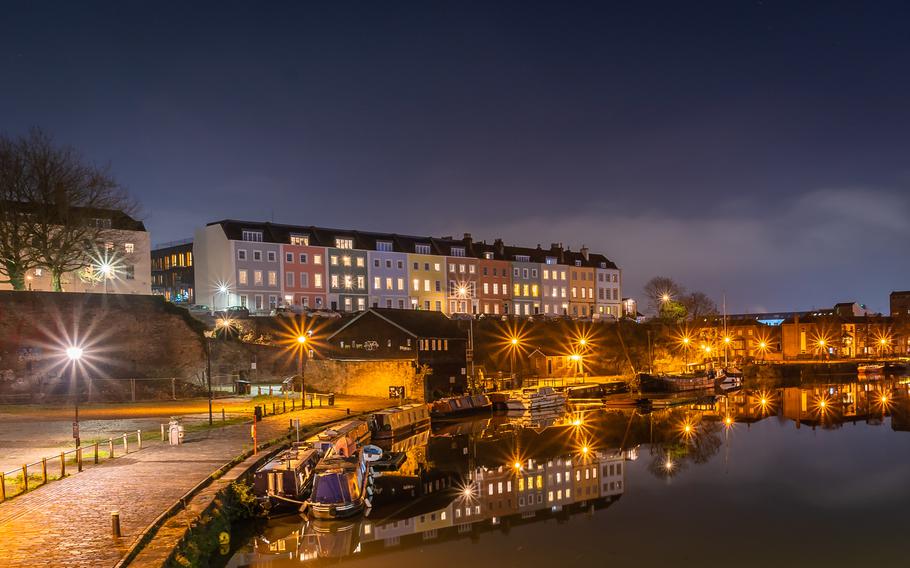 A beautiful view of the night Bristol with illuminated lamps in South West England