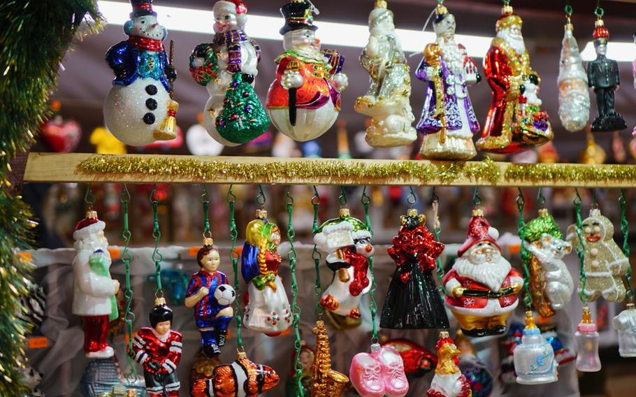 The ornaments for sale at Kraków Christmas Market are a dazzling display of artistry and tradition, making them perfect keepsakes or gifts to bring home. Nestled among the wooden stalls in the Main Market Square, these handcrafted treasures showcase the rich heritage of Polish craftsmanship.
You’ll find delicate glass baubles hand-painted with intricate winter scenes, shimmering stars, and festive designs. Traditional straw ornaments and wooden figurines reflect folk art influences, while ceramic decorations and lace accents add a touch of elegance. Many stalls feature unique, locally made amber ornaments, blending natural beauty with festive flair. Whether you’re seeking modern designs or traditional touches, the ornaments at Kraków’s Christmas Market capture the magic of the season and the charm of Polish culture.