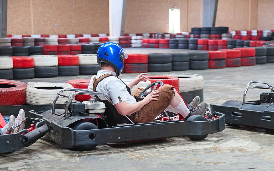 Indoor karting race with karts ready to start