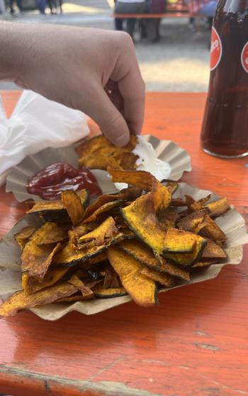 Bright orange pumpkin cut up as french fries.