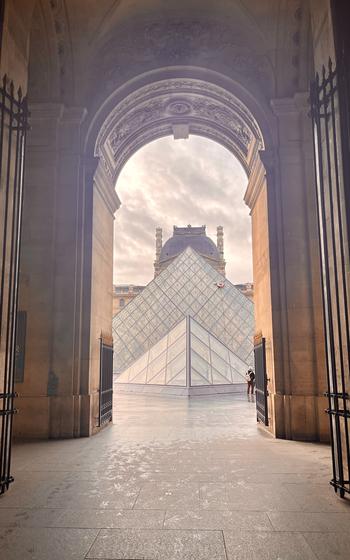 Walking Through the Gates to the Louvre