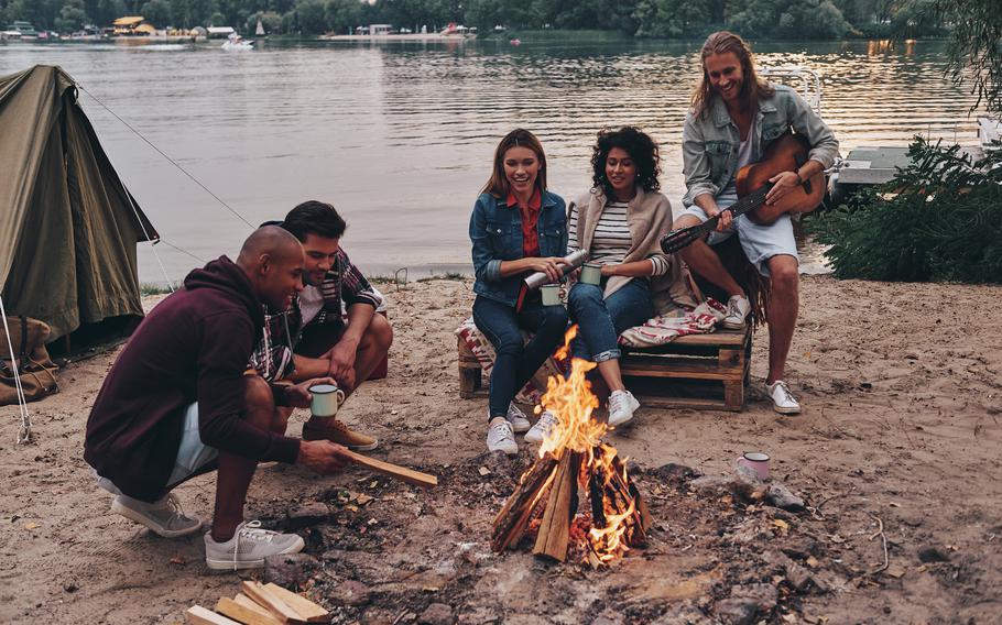 Gathering with friends around a campfire