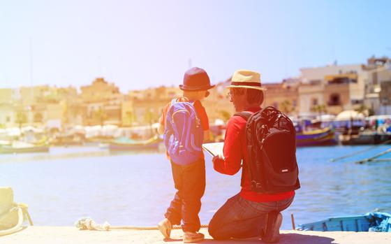 Dad sharing a map with his child