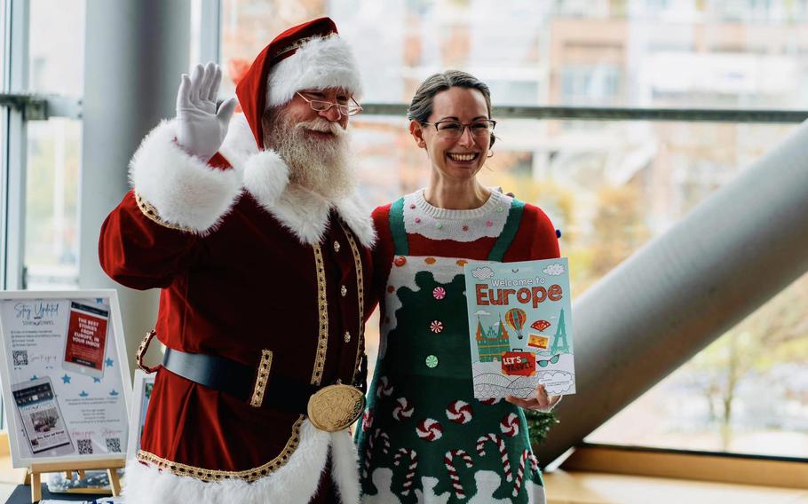 Santa and elf Kristen Kringle at the USO on Ramstein AB