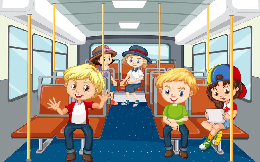 Kids seated on the bus. 
