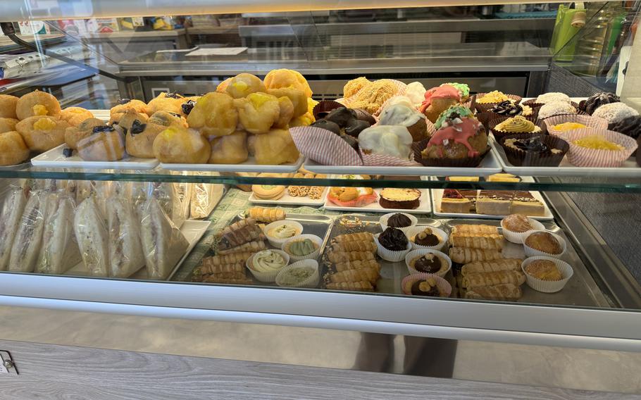 Various pastries like cream puffs