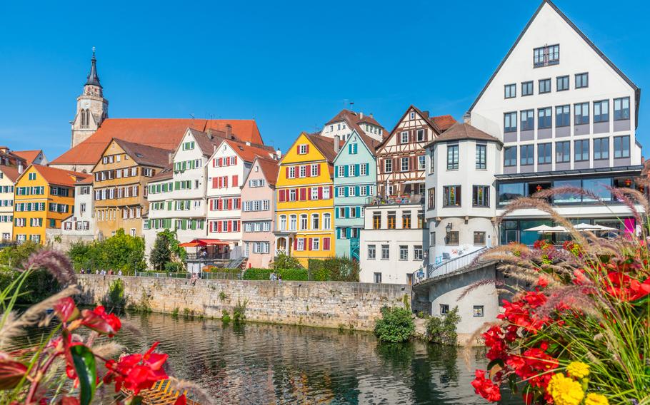 Colorful facades of houses alongside river Neckar in Tübingen, Germany