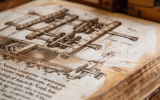 A close-up of a book page from a history textbook. The page is about the invention of the printing press. The page is illustrated with a picture of a printing press.