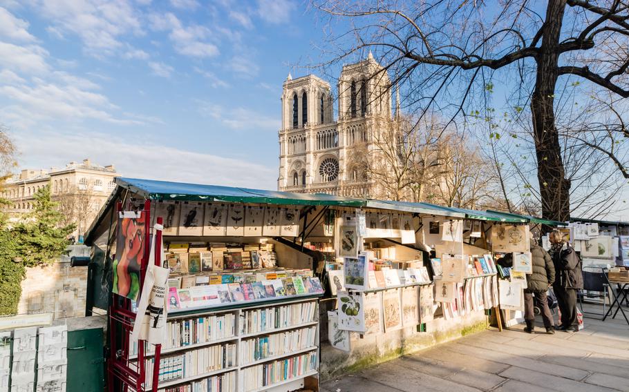 little bookstands in front of a big cathedral