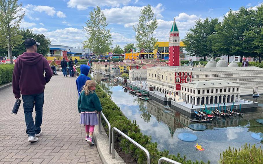 Parent and two children looking at Miniland in Germany