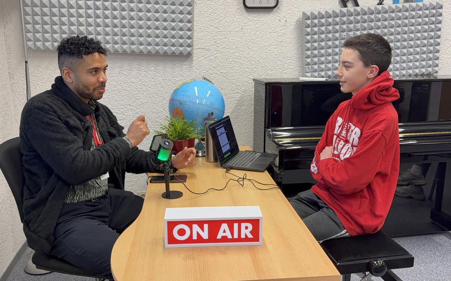 Vogelweh Keystone Club and AFN volunteer Dom Ingram work on the club’s new podcast.