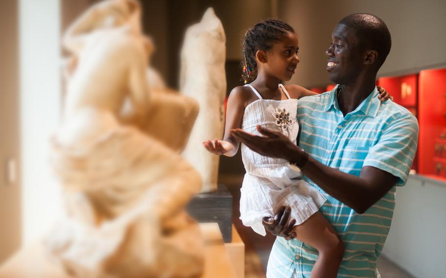 Dad and daughter at museum