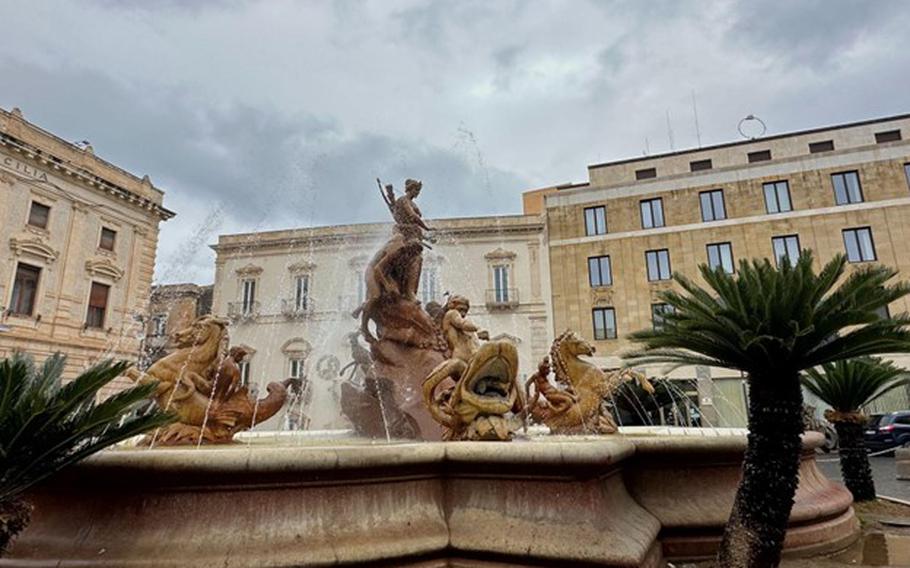 Fountain of Athena with water coming out of the spouts