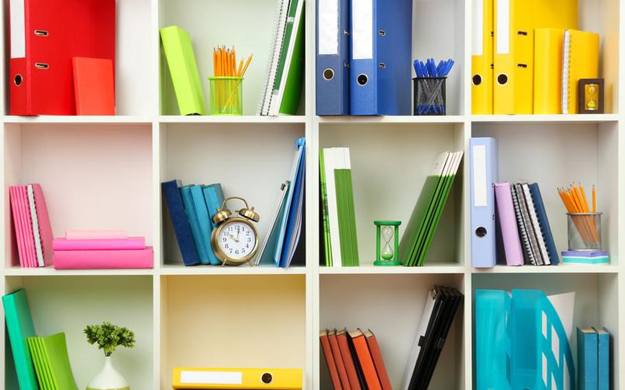 Organized cubbies with colored-coded supplies.