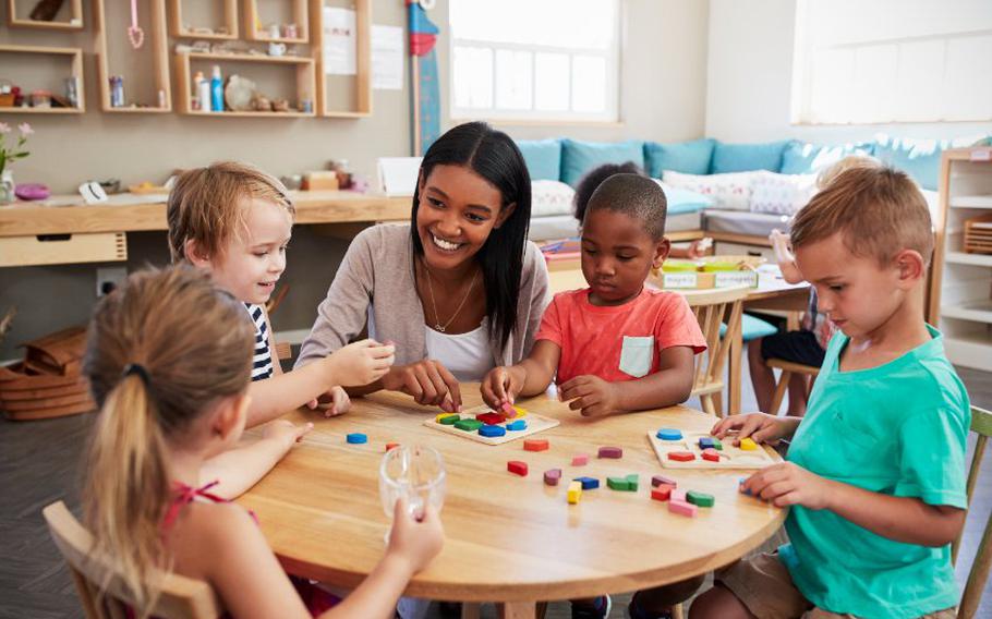 Teacher with students