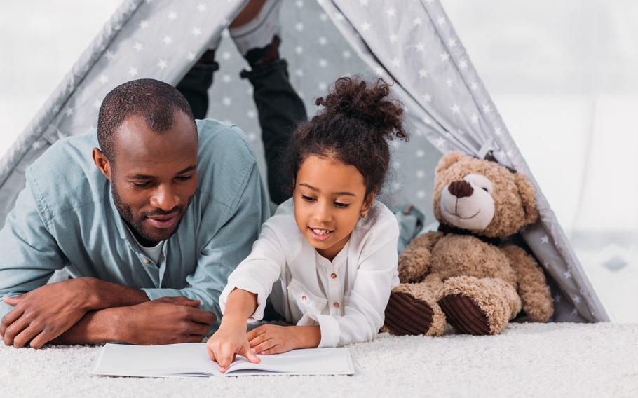 Father and daughter playing