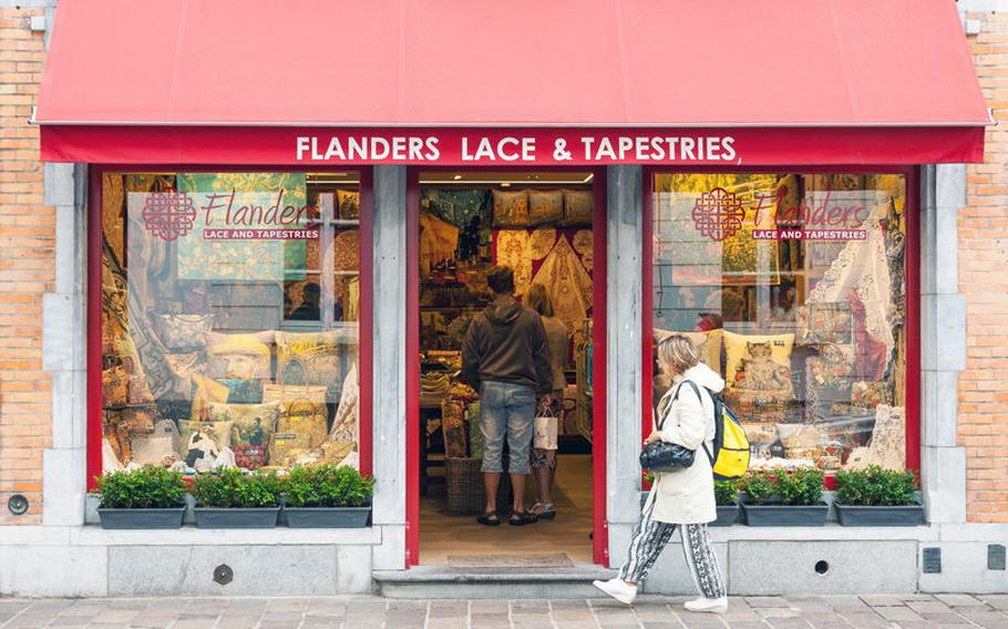 Traditional Belgian handmade lace and tapestries shop | Photo by Vaidas Bucys via 123RF.