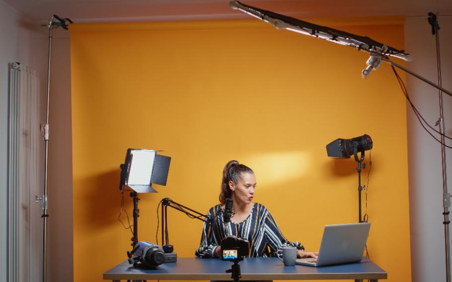 Influencer in her professional studio recording.