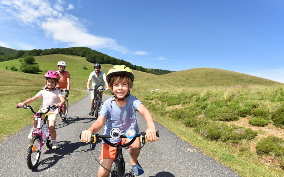 Family riding bikes