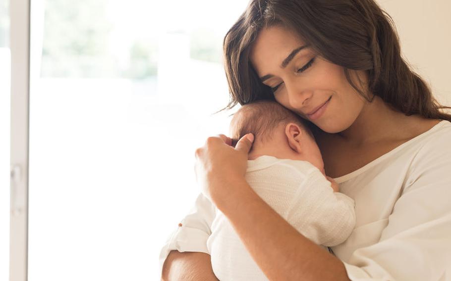 Mother holding child