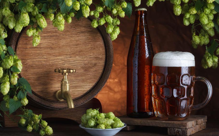  beer mug and tapped barrel