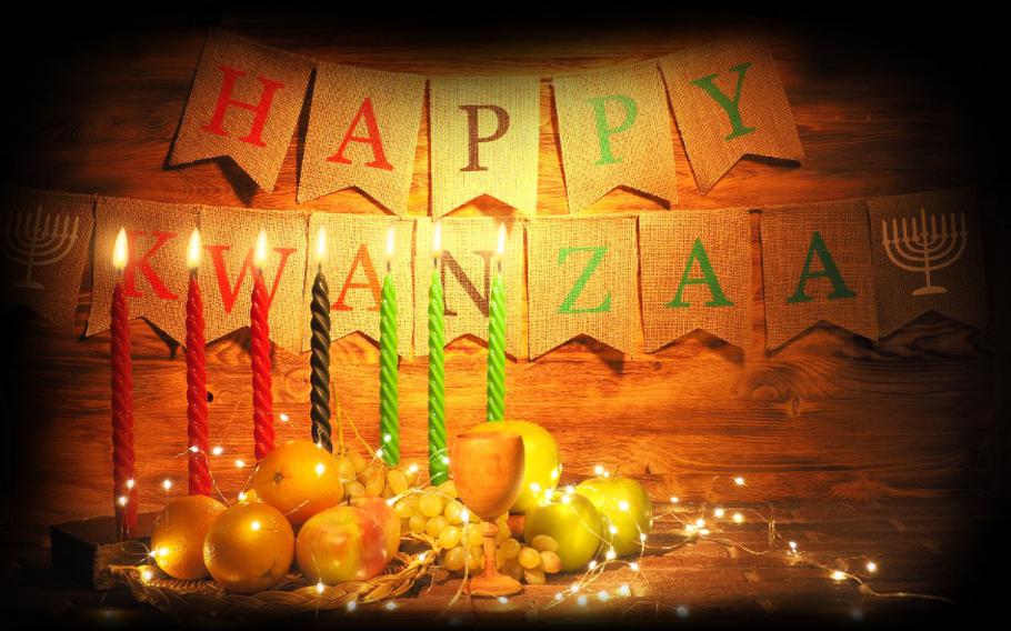 Happy Kwanzaa sign with candles