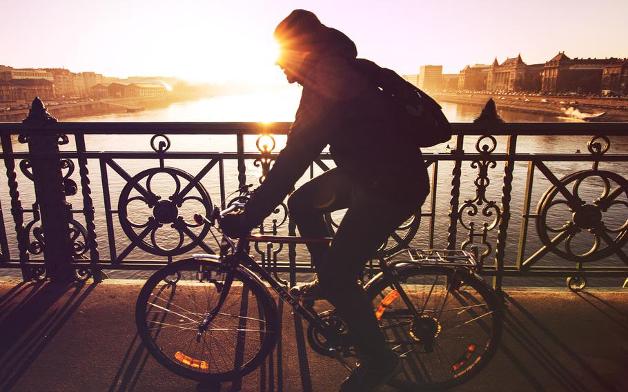 Person on bicycle | Photo by Viktor Kern