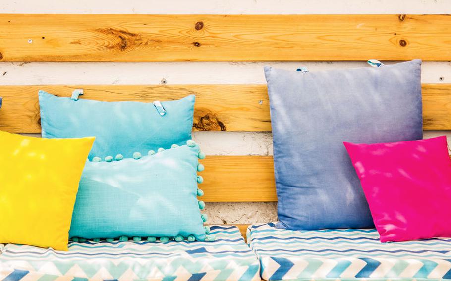Pillows on an outdoor bench