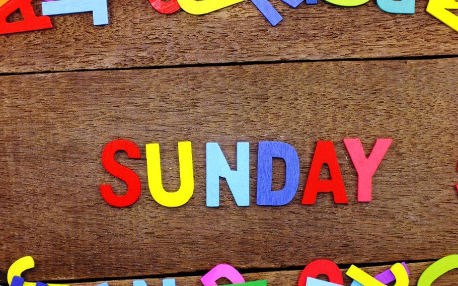 Sunday spelled with wooden letters