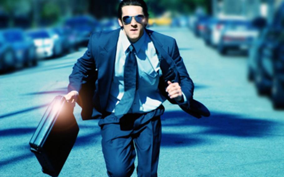 Person running with briefcase