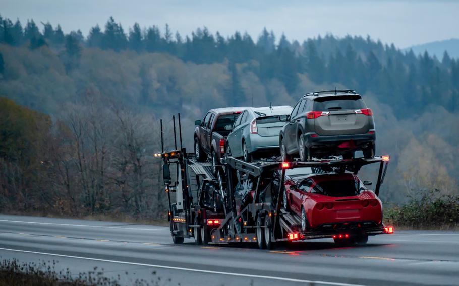 Cars loaded up on a semi-truck
