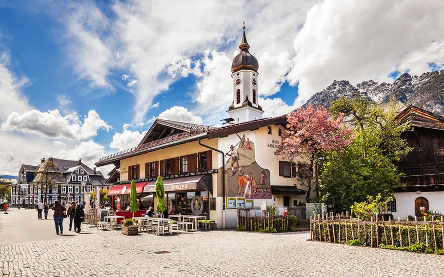 View of the street in Garmisch-Partenkirchen in Bavarian Alps. | Photo by Demchishina Olga via 123RF.