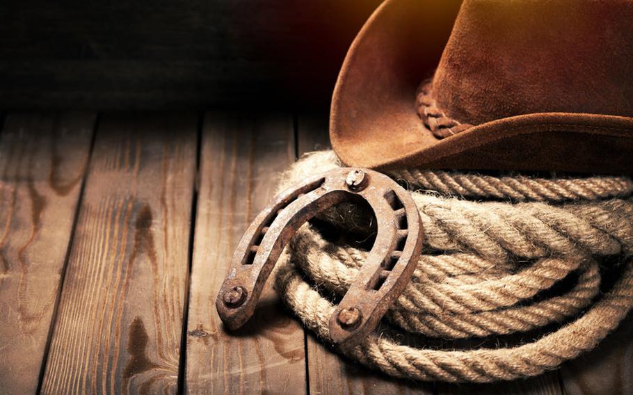 Cowboy hat and rope.