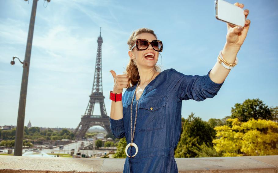 Person taking selfie in Paris